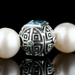 Paladin Swiss Blue Topaz - Pearl Bracelet II (8mm) 8 Paladin Swiss Blue Topaz - Pearl Bracelet II (8mm) -Aurum Brothers square3 PaladinSwissBlueTopaz PearlBraceletII 8mm